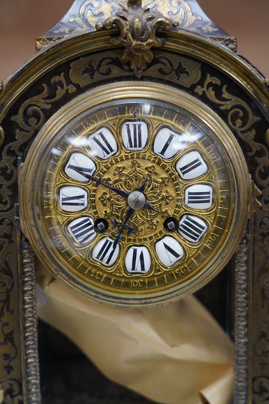 A late 19th century French boulle work mantel clock, with key and pendulum, 40cm. Condition - fair to good, generally worn, not tested as working